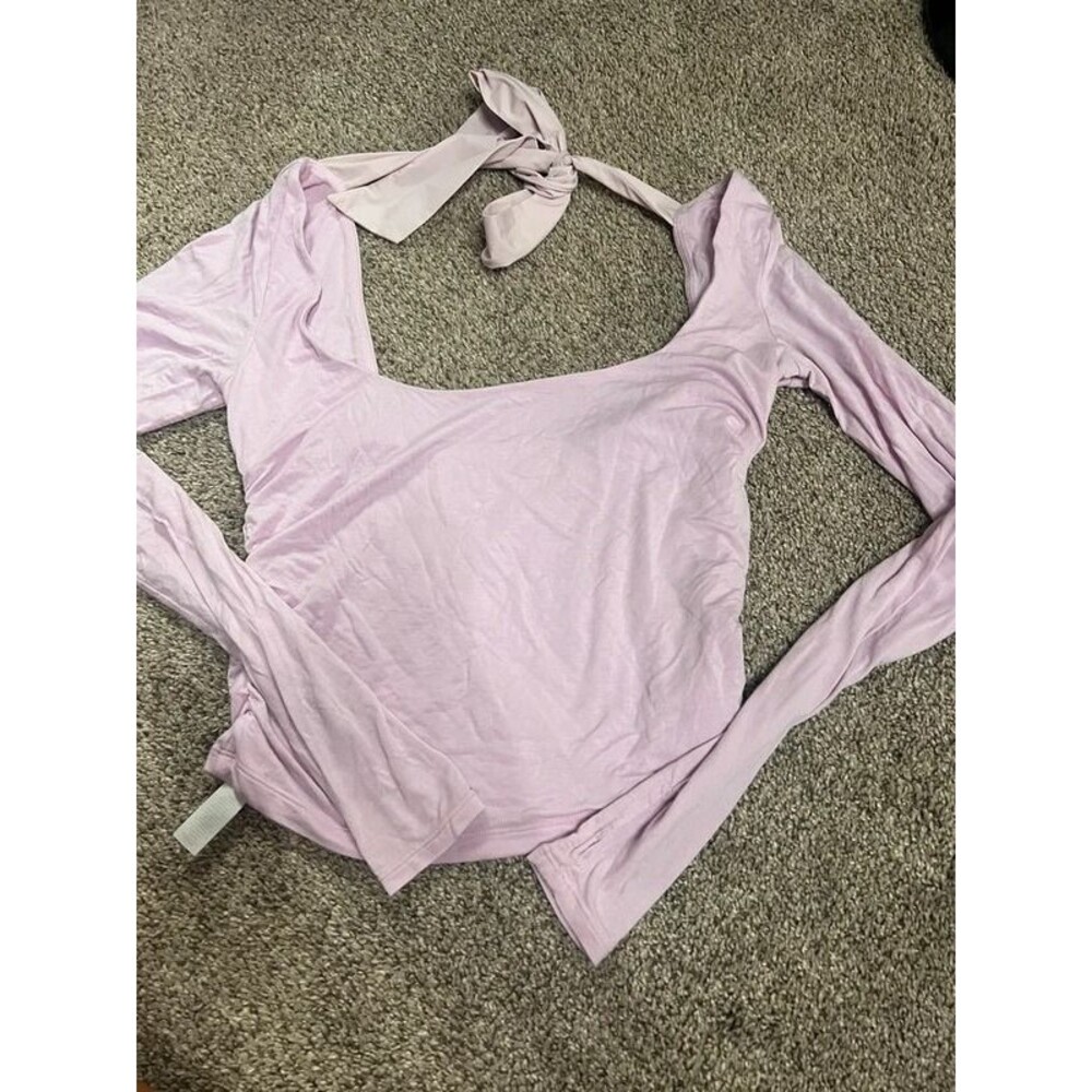 NWOT Blogilates long sleeve pink bow top medium